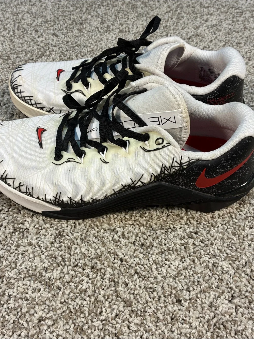 Nike Metcon 5 Amp White  Black training shoe.  Naughty and nice list
